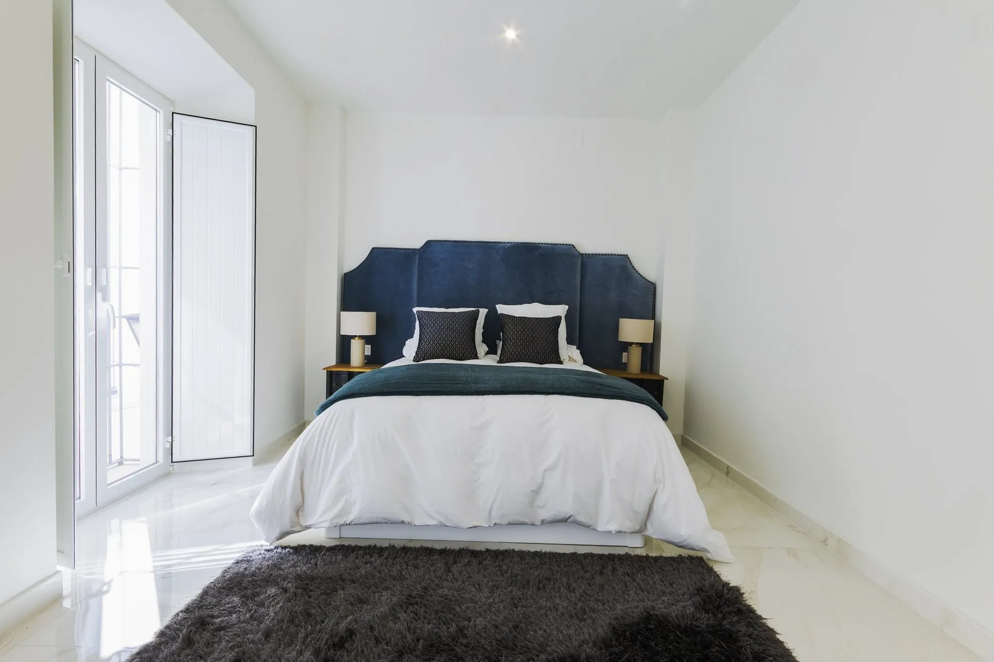 Dormitorio principal de una casa reformada por Stylo 10